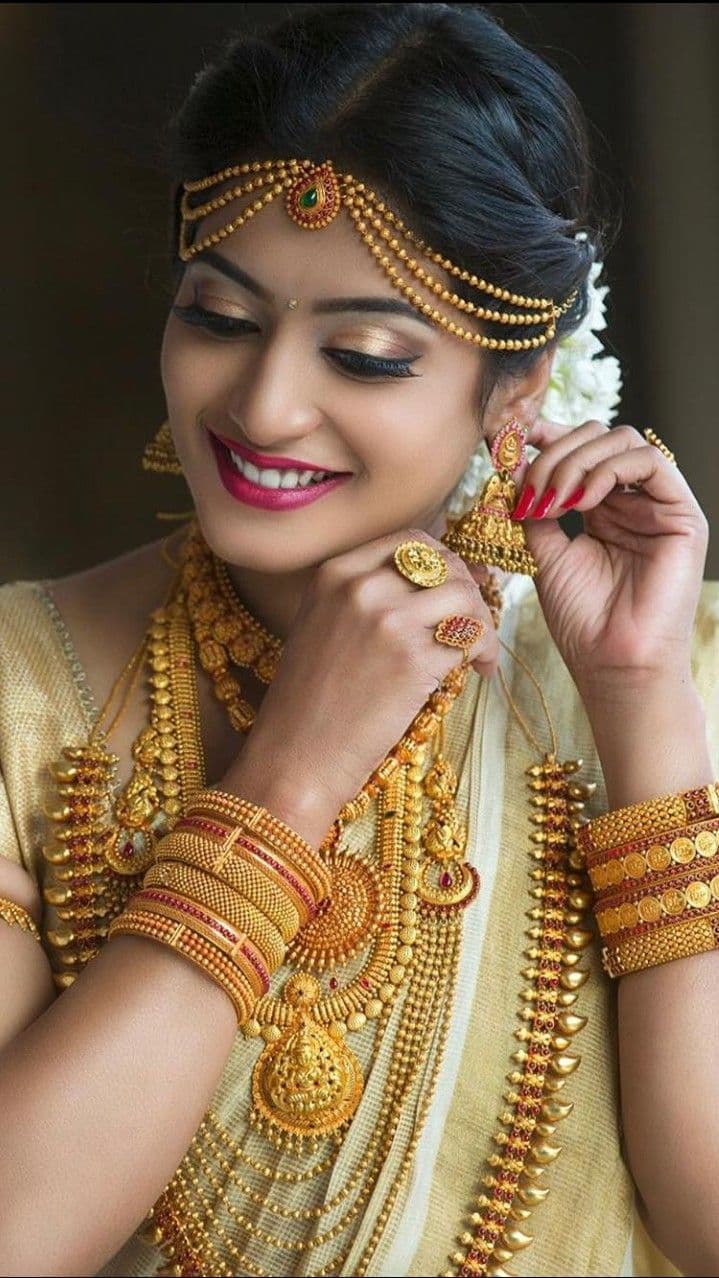 Woman wearing gold jewellery